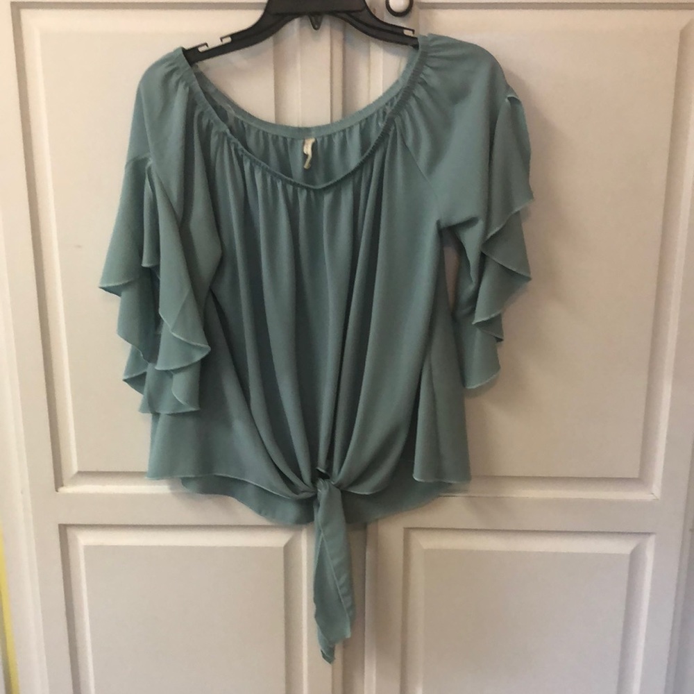 Beautiful top with cascading ruffle sleeves